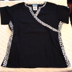 1 scrub top, brand is Butter-Soft scrubs by UA